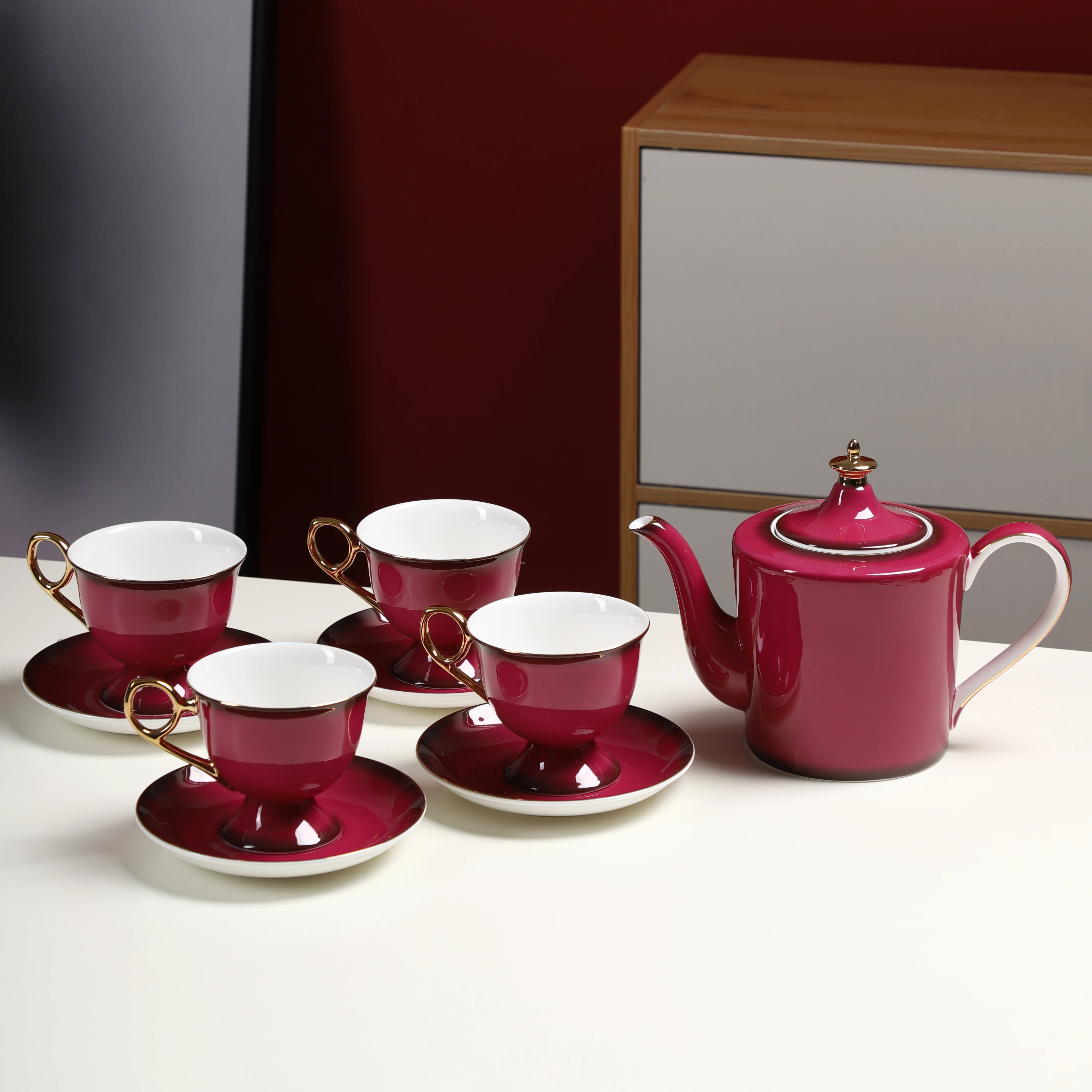 

2021 New arrival wholesale afternoon tea set customize gold rim handle coffee cup saucer teapot bone China tea set