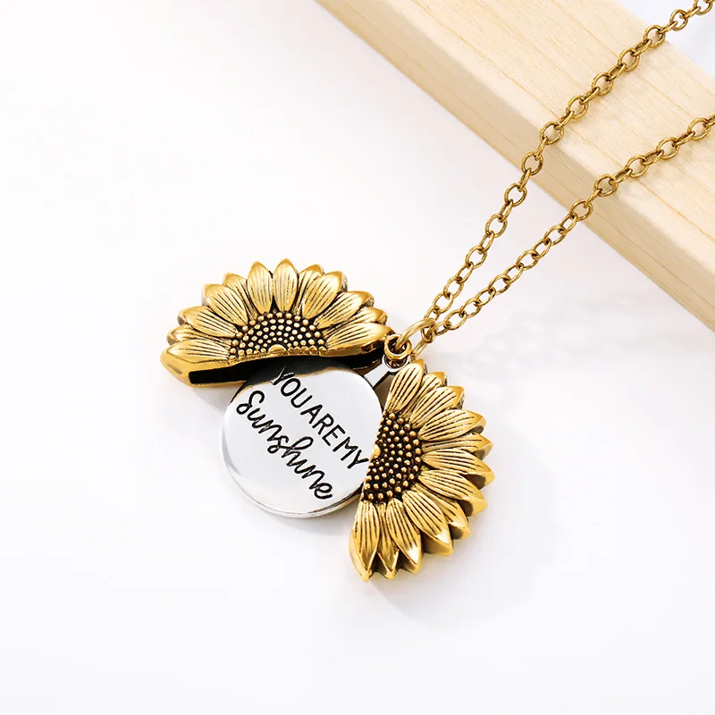 

Wholesale Antique Gold Silver Open Locket You Are My Sunshine Sunflower Pendant Stainless steel Necklace For Women, 3 color to choose