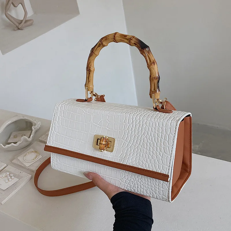 

Women's Fashion One Shoulder Underarm Square Spliced Bamboo Joint Handbag