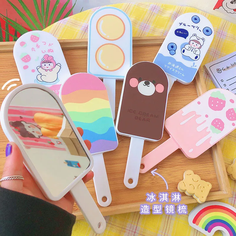 

Makeup mirror wholesale cartoon creative hand-held mirror comb integrated student dormitory handle mirror