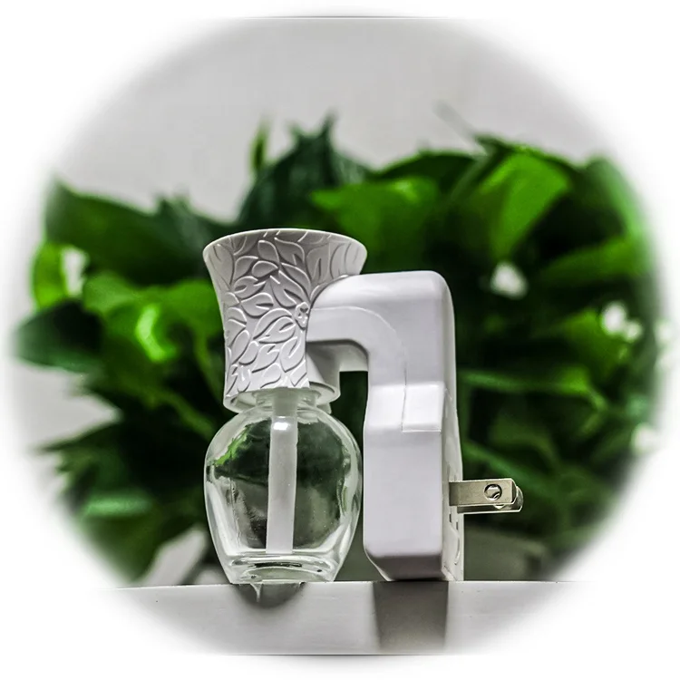 

Indoor air freshener Plug - in heating aromatherapy machine Glass bottle of liquid perfume