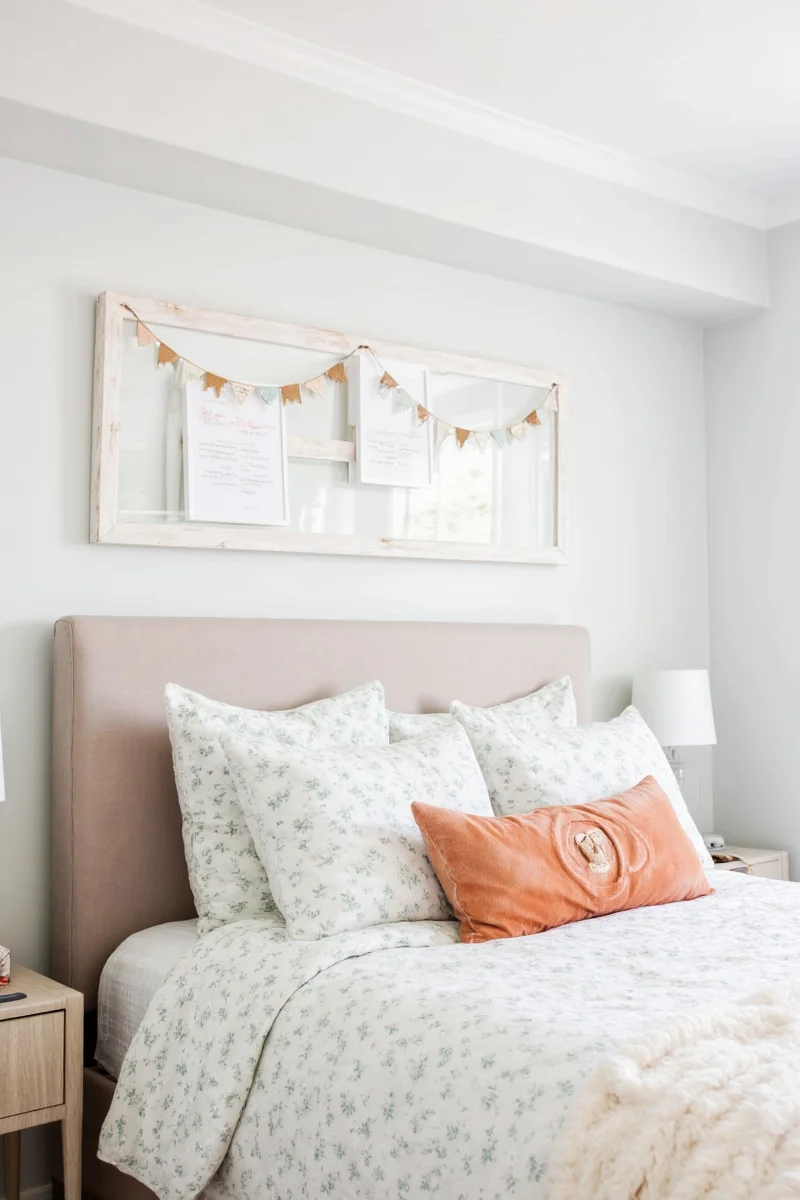 Floating shelves above bed