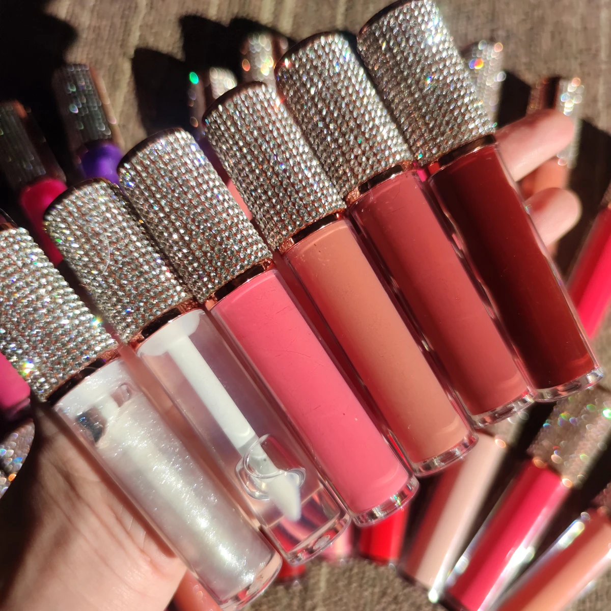 

Wholesale Custom Logo unique Moisture Lipgloss with gold lipgloss tubes