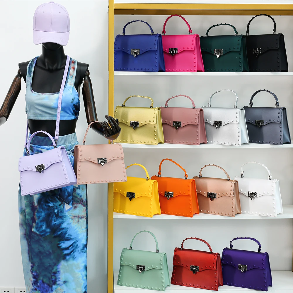 

Fashion solid color rivet single solid shoulder bags jelly purses women handbags for women purses 2021 handbags