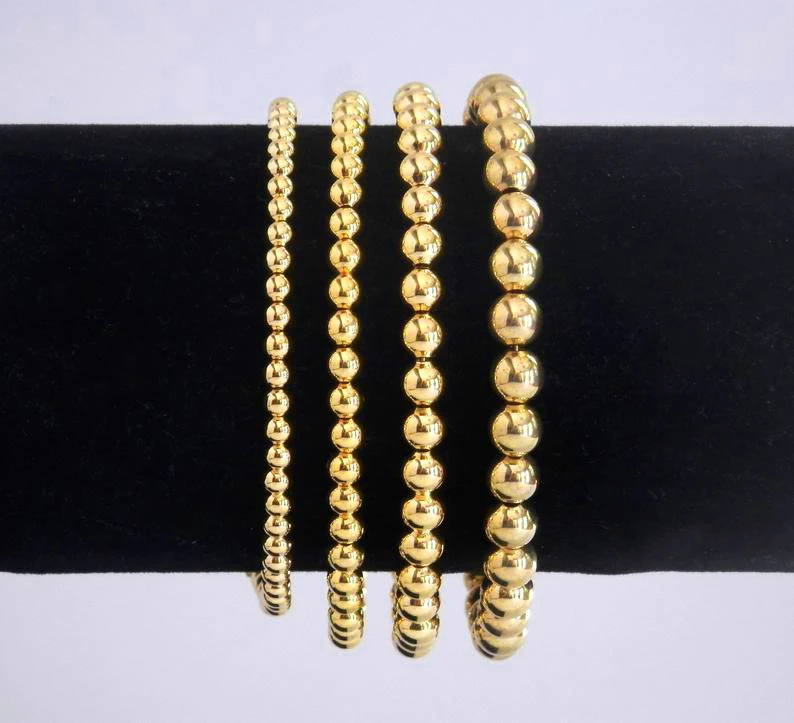 

Wholesale Lucky 14k Gold Filled Beads Beaded Stackable Bracelets Beaded Stretch Bracelet Minimalist, Customized color