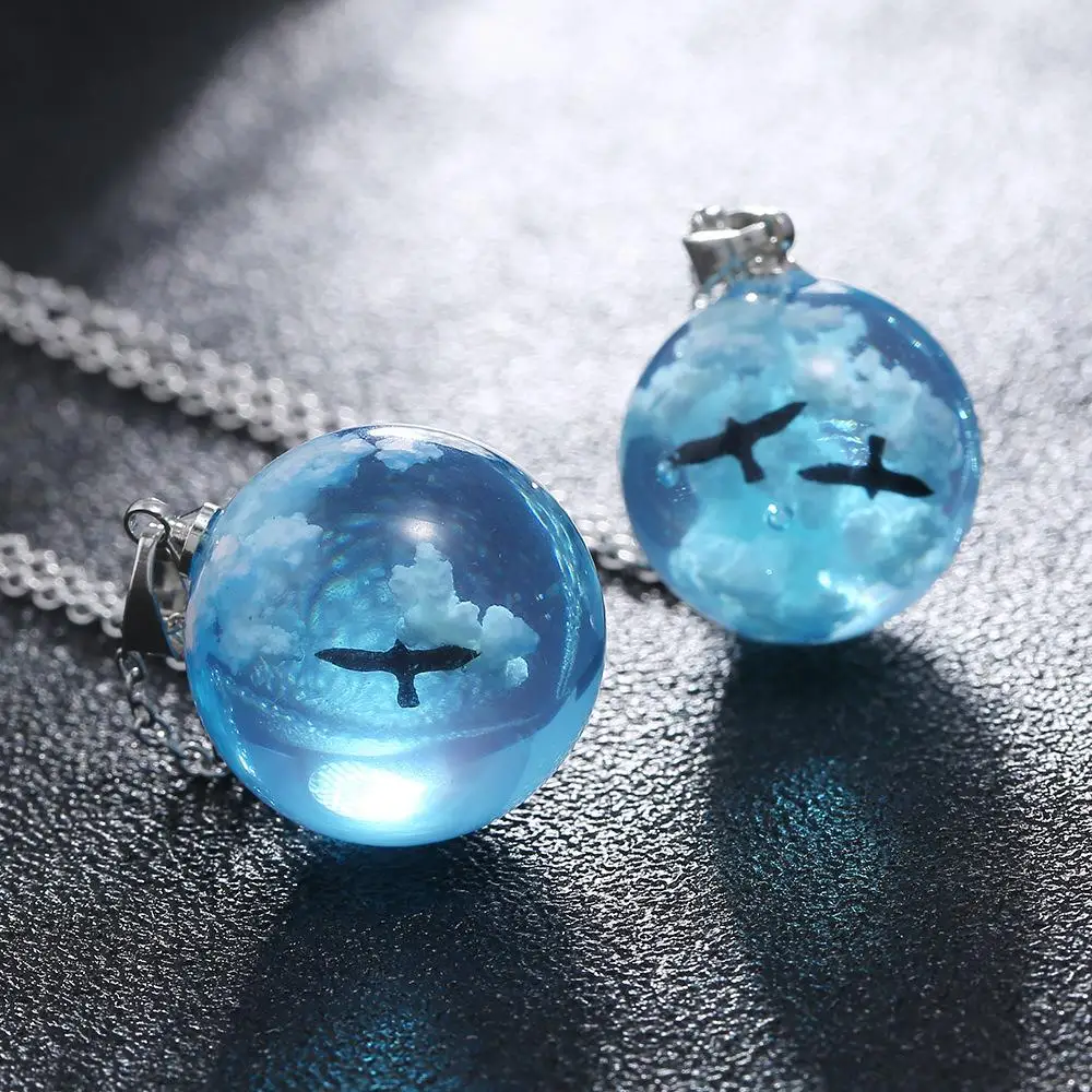 

Hot Sale Luminous Blue Sky White Cloud Ball Pendant Resin Necklace