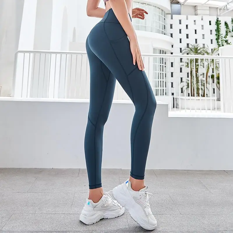 

Wholesale Pockets Leggins 75% Nylon 25% Spandex Sports Joga Women Leggings Deportes Pants Yoga Legging, Customized color