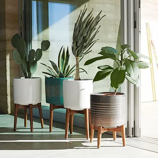 

vertical morden flower plant stand pot with wheels garden movable line plant stand