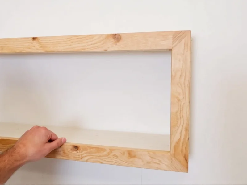 DIY wall shelf assembly with bracket alignment demonstration