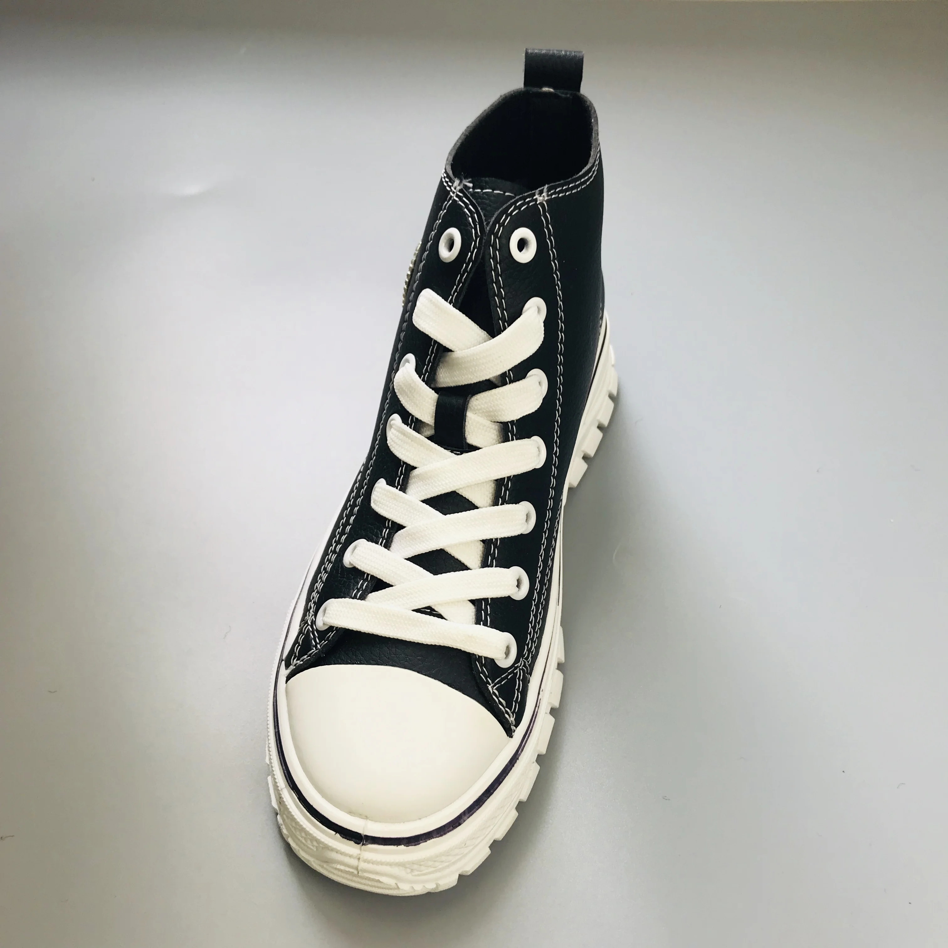 all white with black shoes