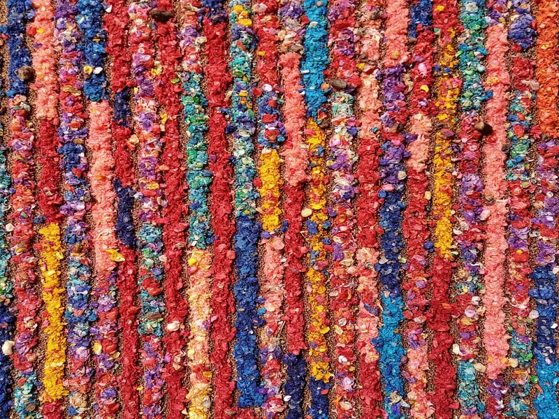 Handmade textile wall art from fabric scraps