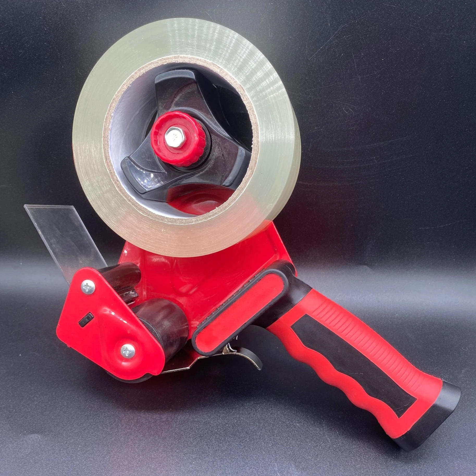 

Red black color 2 inch duty heavy industrial packing tape dispenser gun with hook non slip rubber handle 1roll clear tape