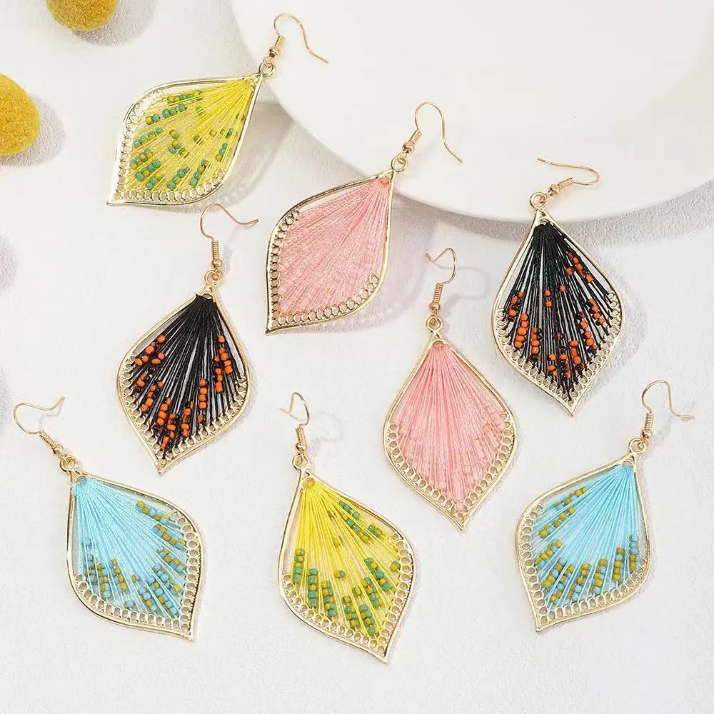 

Wholesale creative braided thread ethnic style handmade earrings drop shape rice bead earrings, Pink black yellow blue