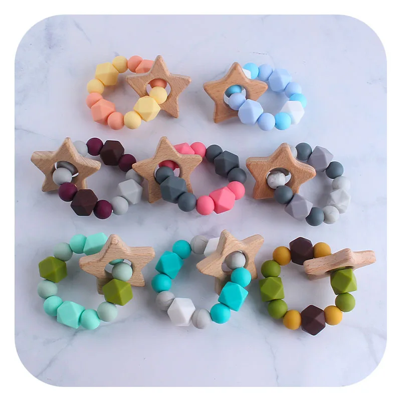 

Hotsale Wooden Rattle Teether Baby Toys Engraved Wood Beads Hexagon Teether Silicone Beads Tiny Rod Baby Crib Rattle For Baby