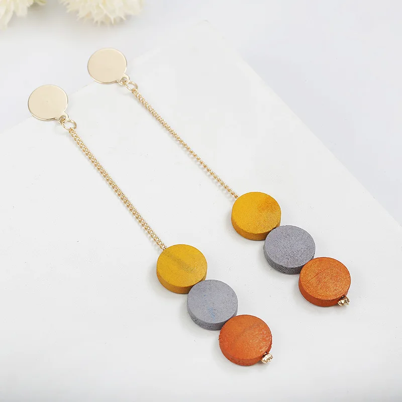 

Christmas fashion spell color round wood earring long pendant simple personality, As pic
