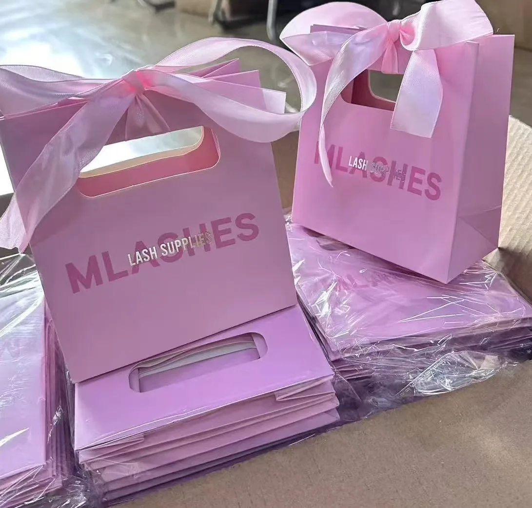 Custom Luxury Nude Shopping Paper Bags for the Boutique Collection Gift Packaging Bags with Ribbon
