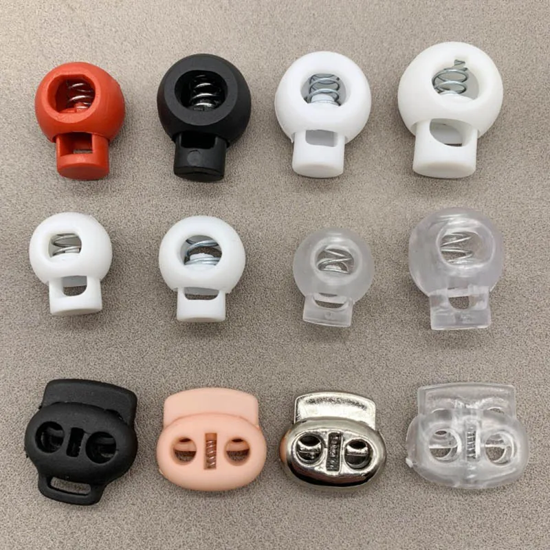 

Wholesale high quality white plastic stopper custom metal rope toggle spring cord lock cord stopper, White/ black or custom