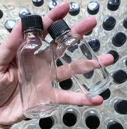 

2oz Small Clear Glass Bottles with Lids for Liquids Tiny Short Jars with Caps Mini Glass Juice Bottles for Potion Ginger Shots