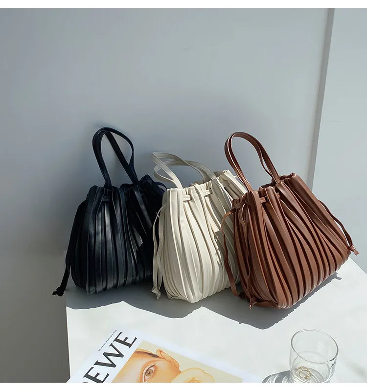 

Korean Version Fashion Shoulder Stripe Hand Bags Online Shopping PU Hand-held Pleated Handbag, As photo