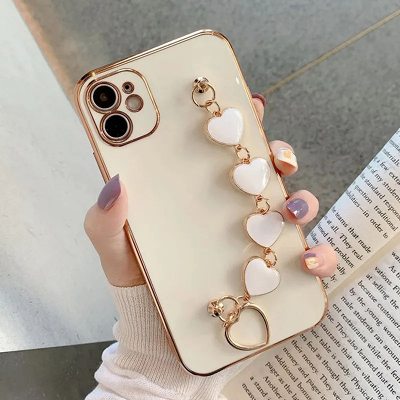 

Case Luxury Gold Plated Electroplated Heart Bracelet Hand Strap Holder Cover For iPhone 11 Pro Max XR X XS 12 mi 8 Plus SE 2020