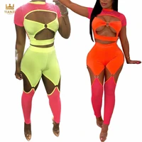 

MH9345 - women sexy cut out pants and short sleeve crop top two piece set