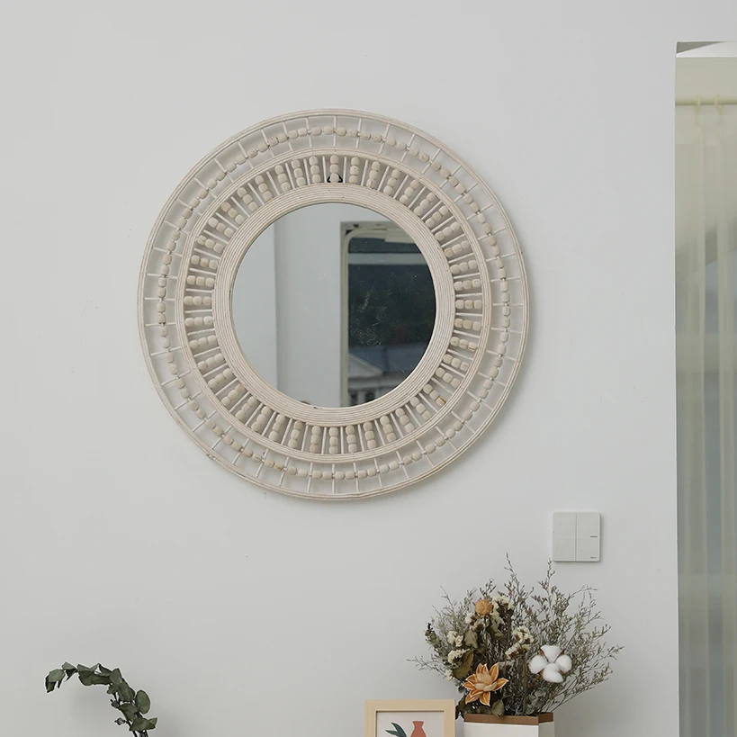 

Black round wall decoration with mirror