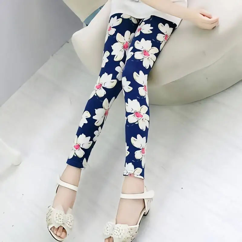 

Girls printed milk silk leggings spring and summer small medium and big children's nine-point pants children's wear