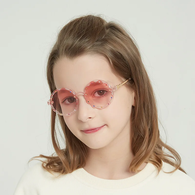 

Children wholesale fashion girls rimless cute diamond shades kids uv400 round personality sunglasses