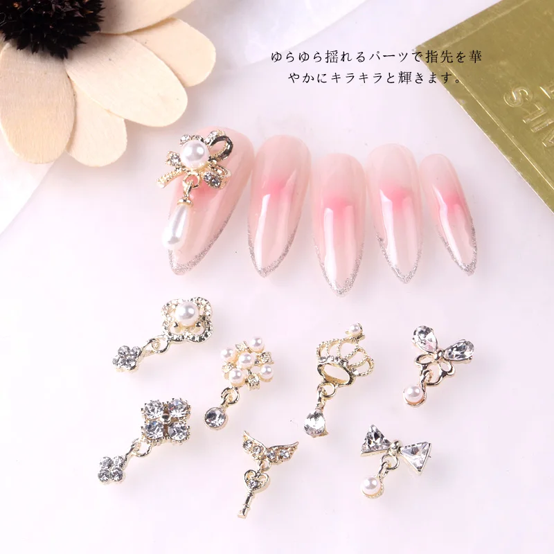 

TSZS 2022 Popular Design Nail Art Pearl Charms Gold Silver Metal Nail Decorations DIY Pendant Nail Art Accessories