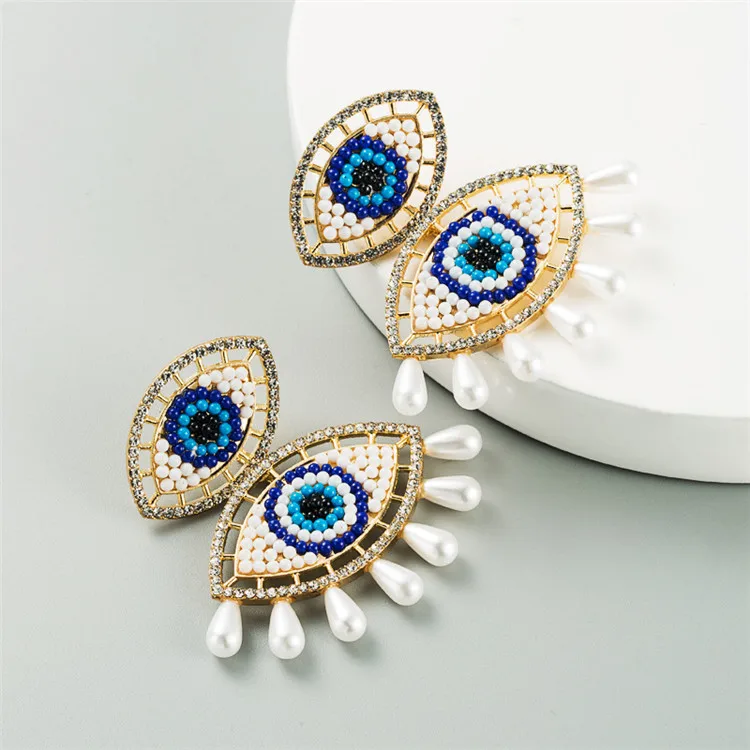 

Za The same demon eye exaggerated personality pearl alloy inlaid rhinestone earrings European and American fashion long earring, Picture shows