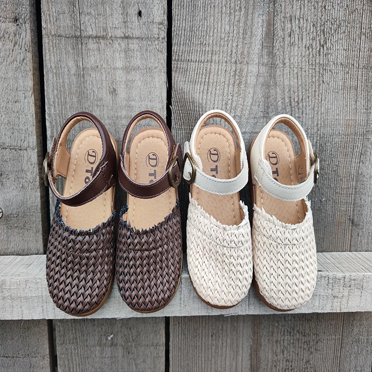 

2021 summer new Korean soft-soled woven little girl princess shoes girls Baotou beach sandals