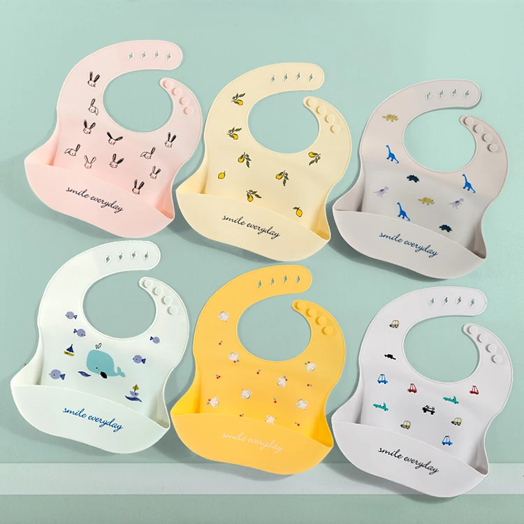 

Anti-bacterial  sell well printed silicone baby drool bibs new type waterproof baby feeding bibs