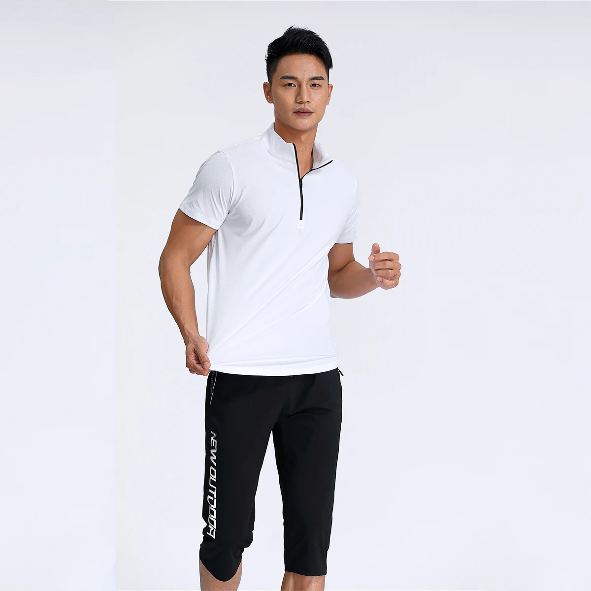 

The hot new summer 2021 men's T-shirt half zipper collar new design short sleeve 2 pieces order free shipping