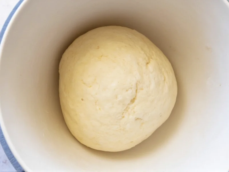 Dough resting in bowl during autolyse phase before adding yeast