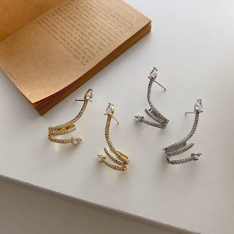 

2021 trendy geometric crystal spiral dangle stud earrings for women