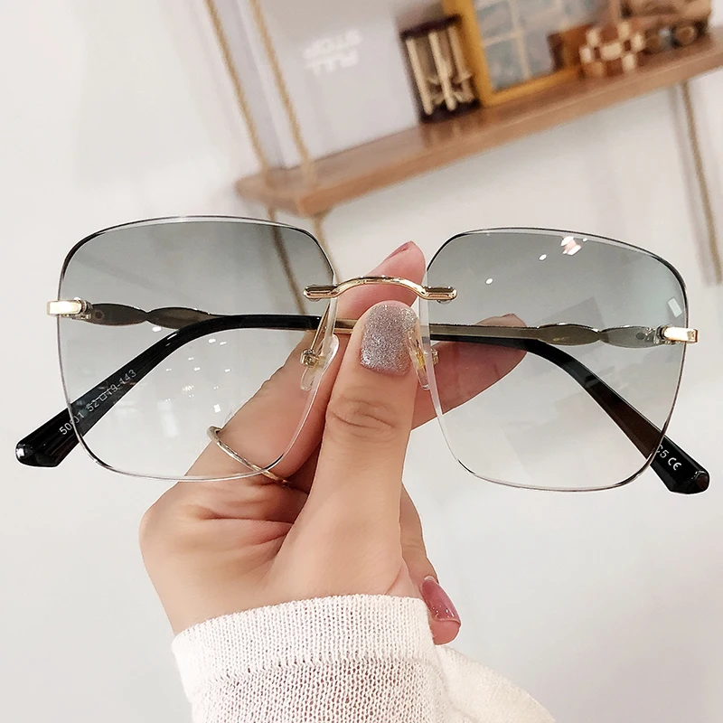 

2021 Metal Frame Oversized Rimless Retro Latest Women Fashion Sunglasses