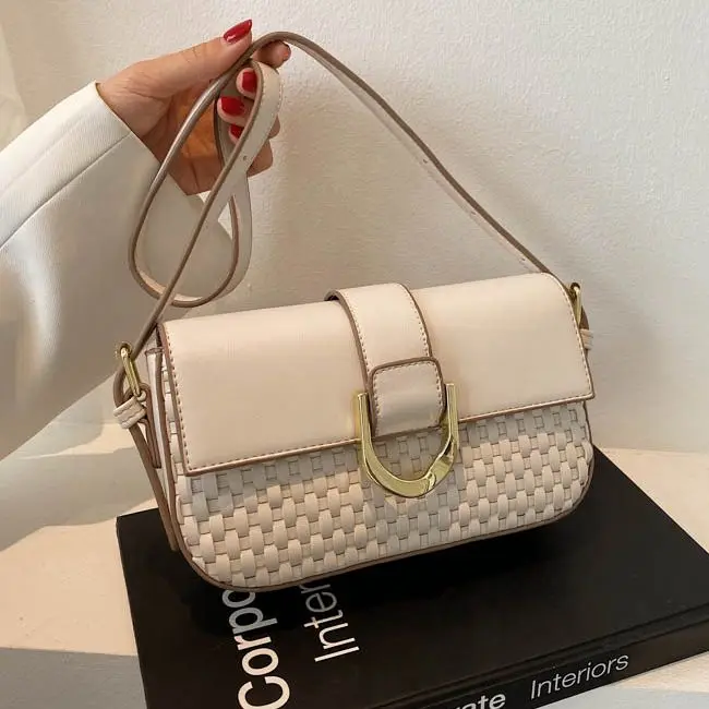 

Manufacturing industry woman handbag bandit irregular half-month underarm handbag