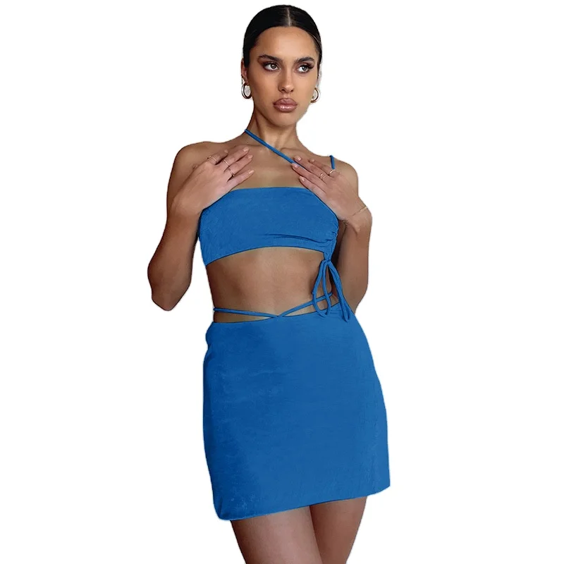 

2021 New Arrivals women sexy Asymmetry sleeveless Hollow out fashion top ladies two piece skirt set