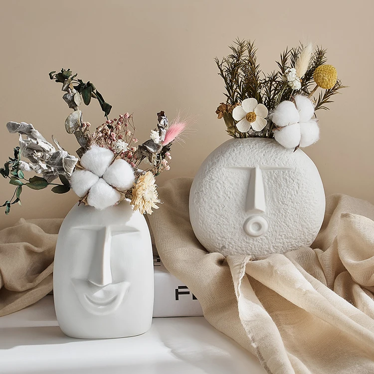 

Wholesale Nordic Creative abstract face white ceramic vase for living room decoration porcelain flower vase table ornaments