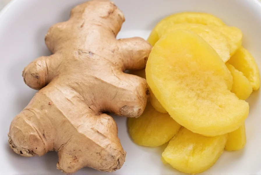 Fresh ginger root sliced with lemon and honey for making nausea-relieving tea