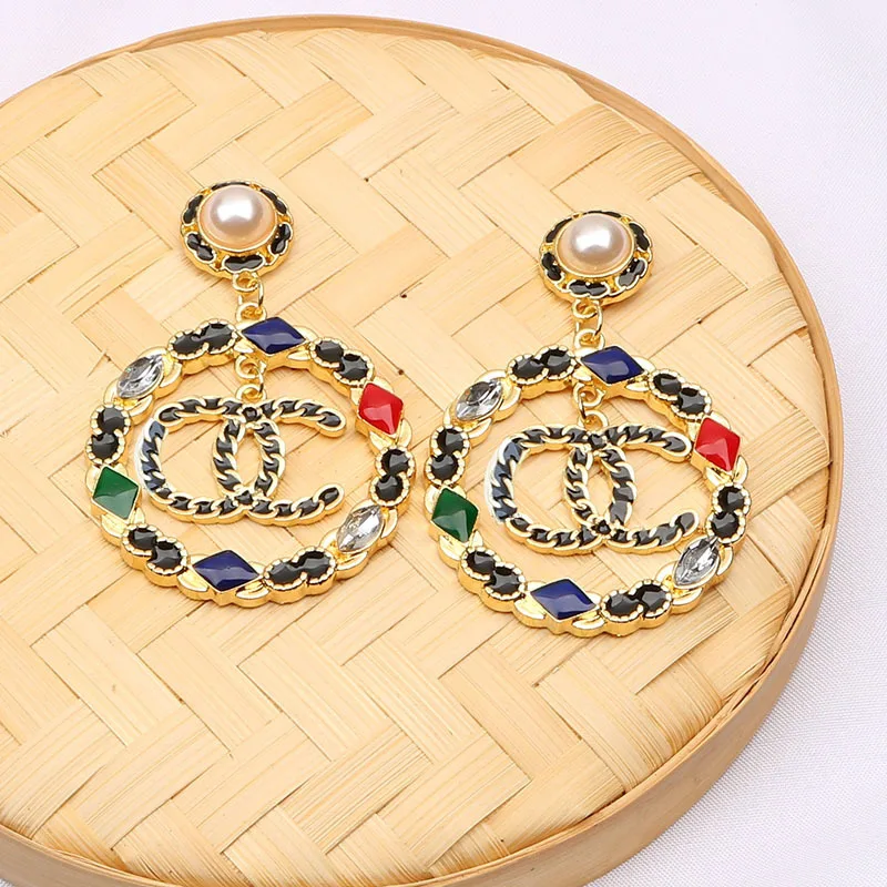 

Designer jewelry famous brands New earrings women long metallic texture designer earrings, Yellow color