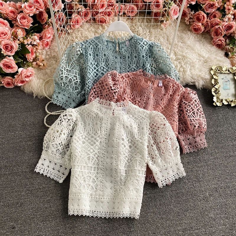 

Wholesale Puff Sleeve 2022 Hollow Lace Shirt Short Sleeve Pure Color Sweet Temperament Fashion Wild Women's Blouses and Shirts