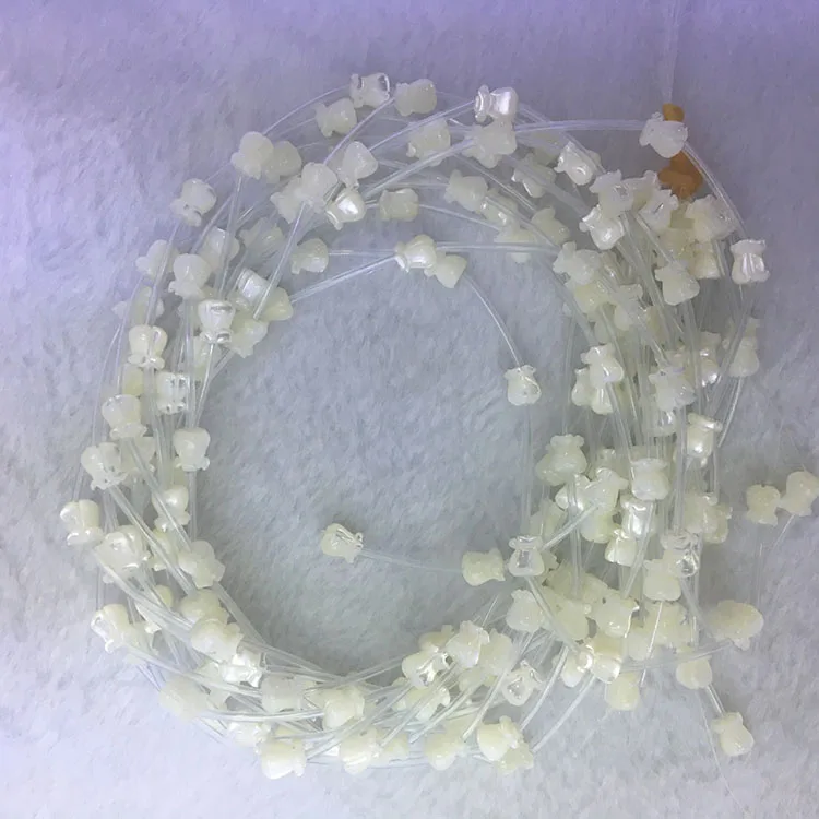 

SP4220 Carved White Mother of Pearl Shell Tulip Flower Beads