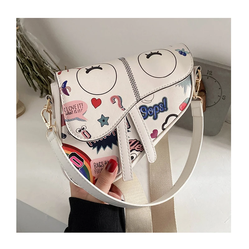 

Cute Cartoon Printed women hand bags designers famous branded Graffiti Luxury hand bags purse Wide Shoulder Strap Saddle Bag