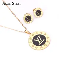 

Fancy Gold plated black shell round circle jewelry stainless steel brands jewelry set