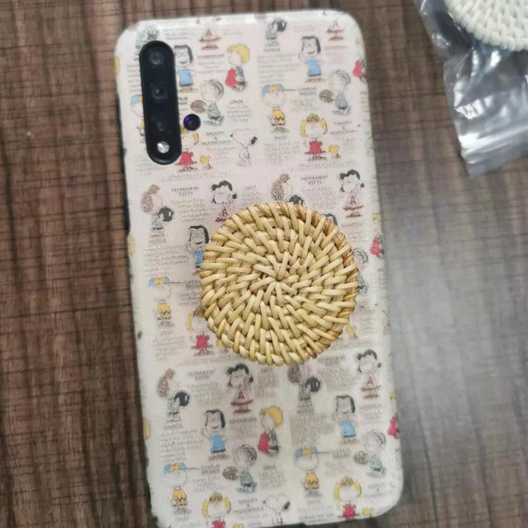 

Wholesale Customized colorful Mobile phone socket with glue adjustable rattan Phone holder Bracket phone accessories