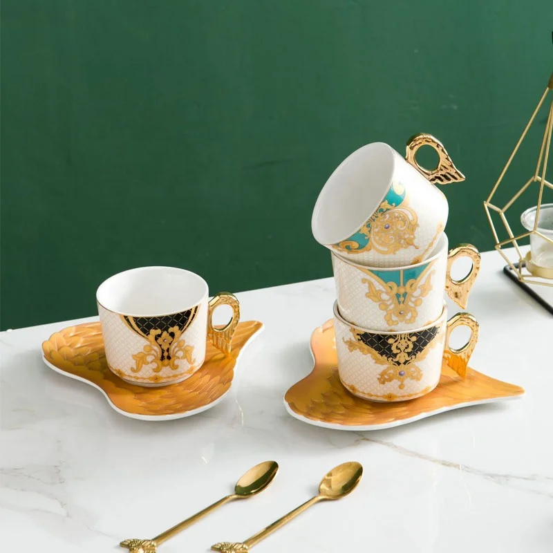 

Angel wings gold classic fashion pattern couple tea cup coffee cup with heart-shaped saucer