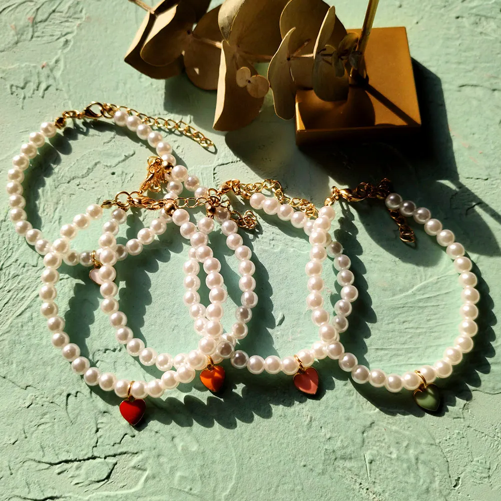 

Exquisite Elegant Fashion Handmade White Pearl Beaded Charm Bracelets With Colorful Gold Plated Enamel Heart Pendant, White color