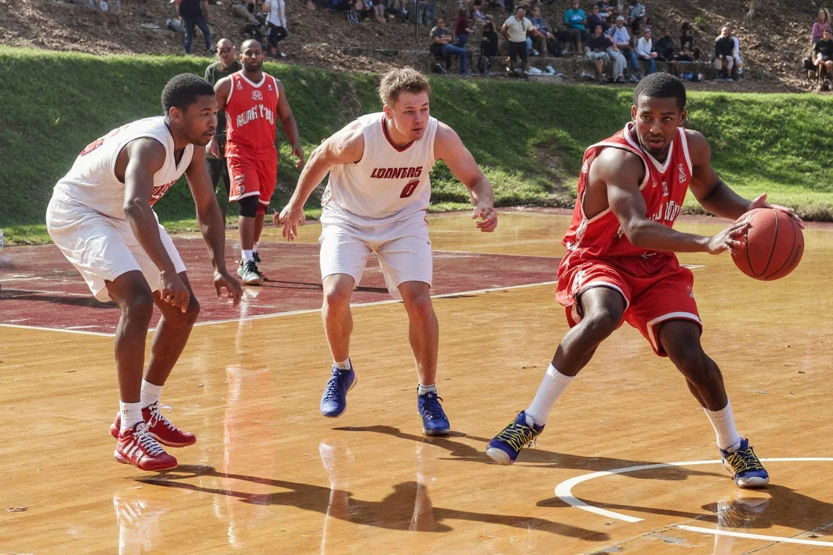 when dribbling a basketball you should never the ball