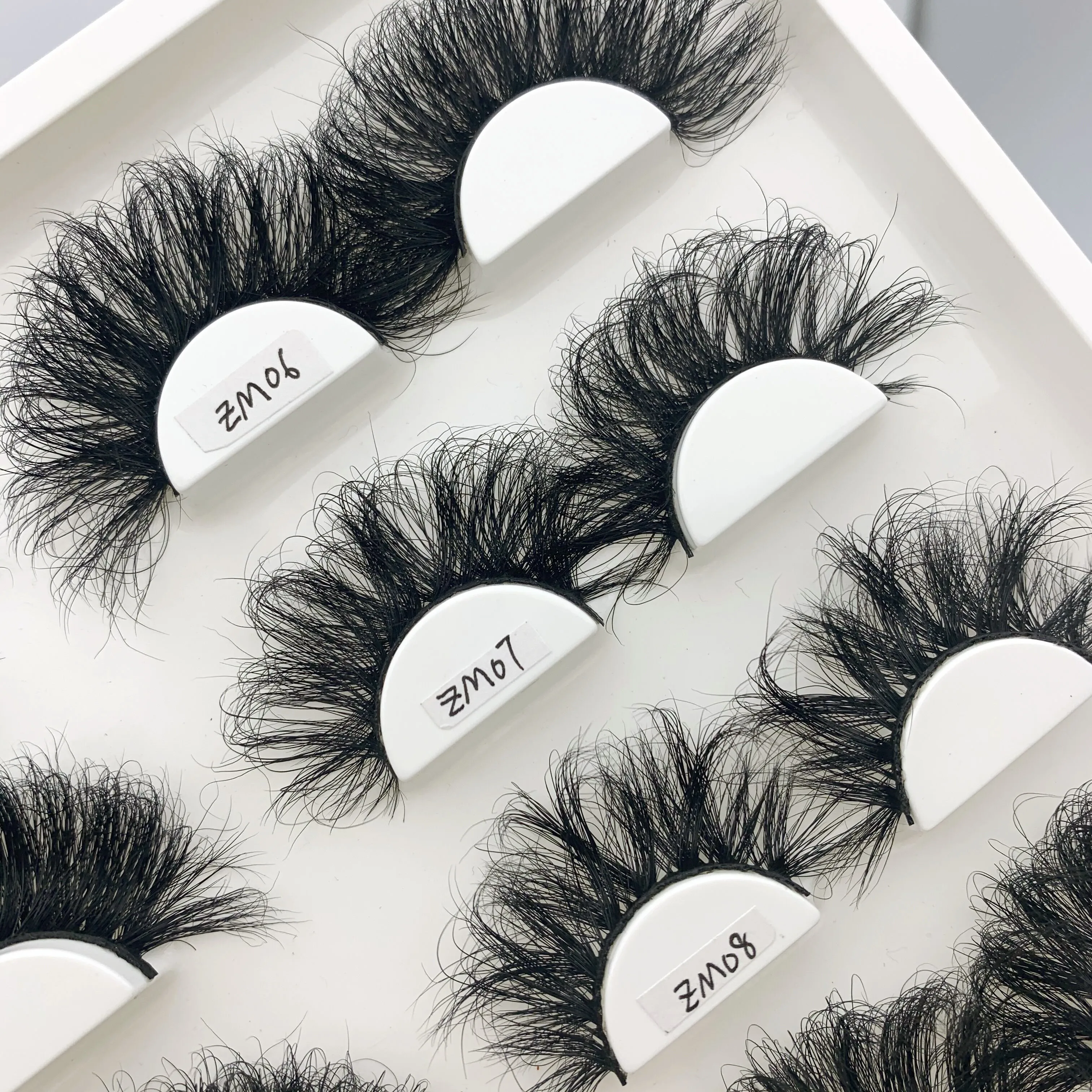 

Full Strip Thick Eyelashes 25mm 3d Mink Supper Curly Fluffy Mink Eyelash Wholesale Vendor Custom Packaging Box Natural 5d Lashes, Black